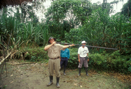 Target practice with the blow dart; Rio Napo, Amazonas district.