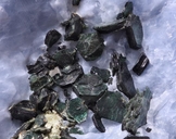 Clintonite Crystals in Calcite