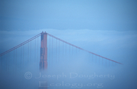 Golden Gate Bridge in heavy fog.