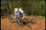 Two Scarecrows taking a ride during Autumn in Vermont