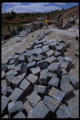 rock quarry, making rock blocks by hand