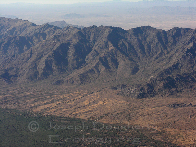 Broad alluvial fan at the base of desert mountains near Phoenix, AZ.