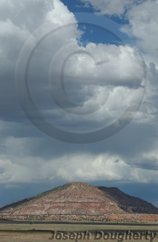 Southwestern Mesa under cloudy skies, east of Gallup, along old Route 66 (beside Interstate 40).