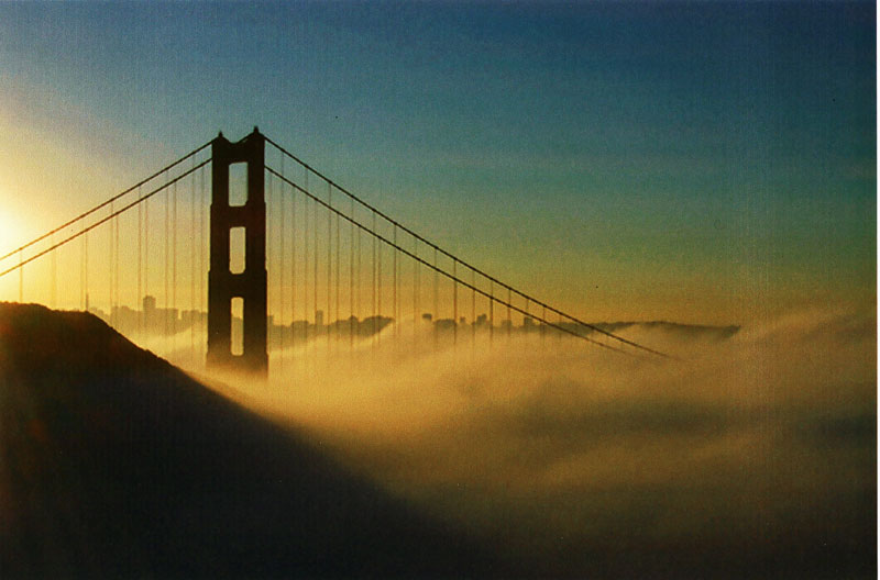 golden gate bridge fog. Golden Gate Bridge in sunrise