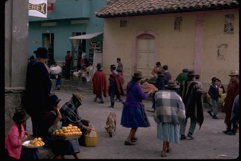 Street scene with strawberry and mango vendors in Saquisili, Ecuador