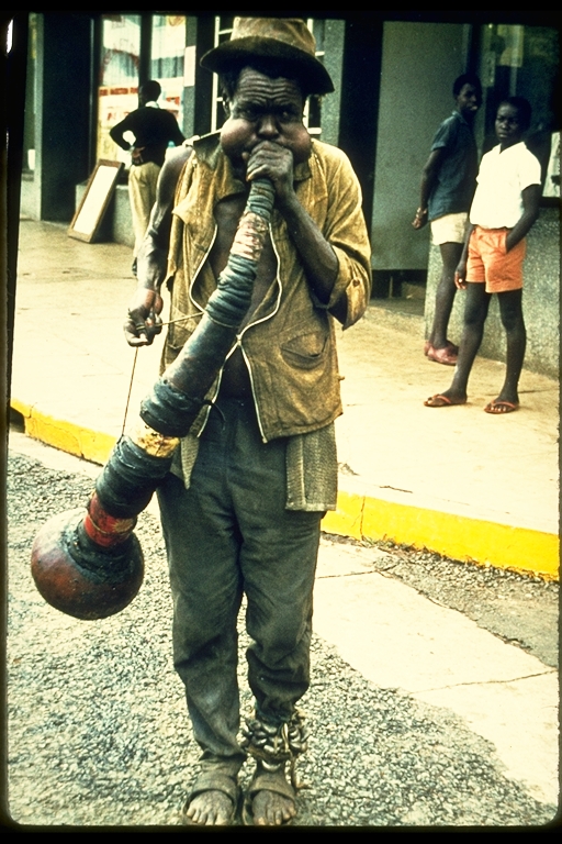 A muscian on the streets of Kisumu in Kenya, Africa