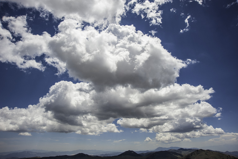 Cumulus clounds over the White Mountains in the Sierra Nevada Mountains in California
