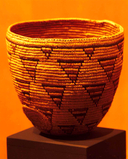 Cowlitz basket; prized baskets were often repaired (note patch woven into basket)