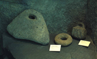 Lithic artifacts: canoe anchor and fish net weights