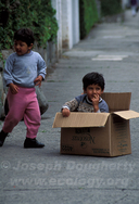 Children playing on the street in Cuenca (Ecuador).