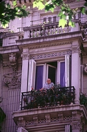 Old man on balcony in buenos aires, argentina