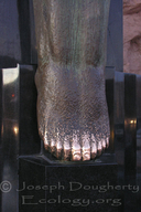 Bronze statue with shiny toes for good luck in Las Vegas, 'Winged Figures of the Republic,' at the Hoover Dam; Colorado River at