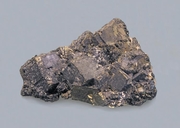 Pyrite coated with Molybdenite