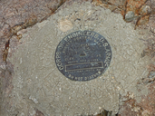 Topographic survey marker on summit