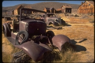Weathered cars and abandoned buildings, Bodie State Historic Park, CA