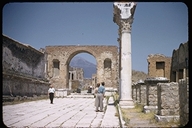 The Arch of Tiberius in the remains of the Forum of Pompeii, Italy