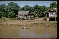 Houses on Stilts along River in Ayudhaya, Thailand