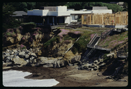 Coastal house damage from wave action and erosion in Cambria, California