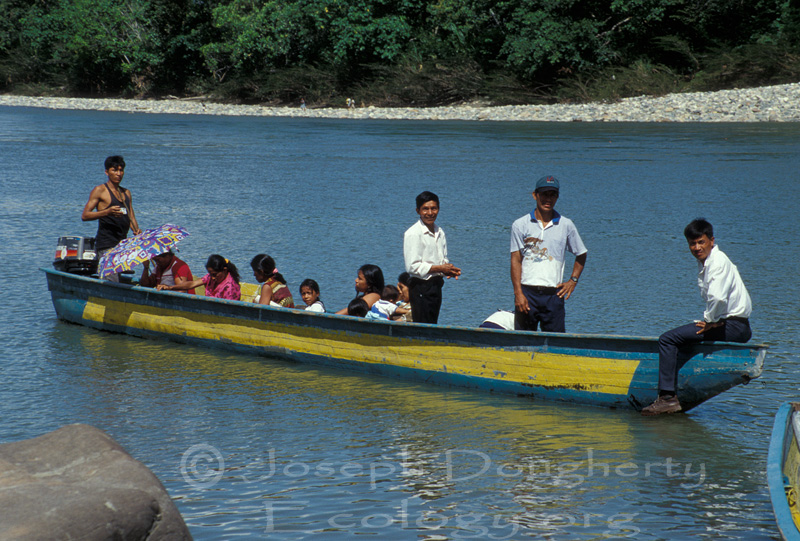 Family in Misahuallí prepares to travel down the Rio Napa via panga taxi.