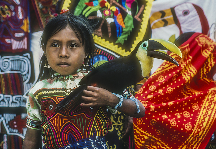 Kuna Indian girl with Chestnut-mandibled Toucan