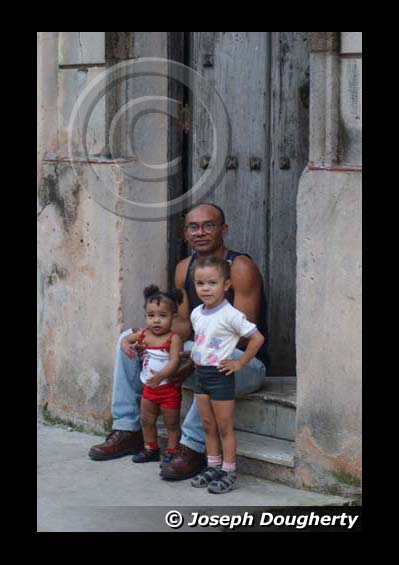 Man with children in Havana