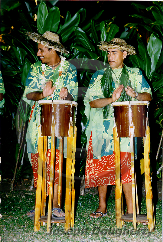 Tahitian men drumming. Tahitian men drumming.