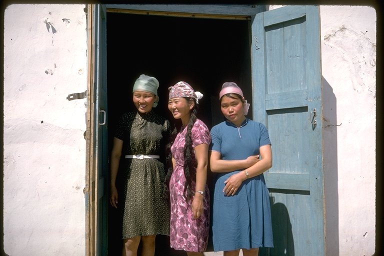 Three women in modern dress Three women in modern dress