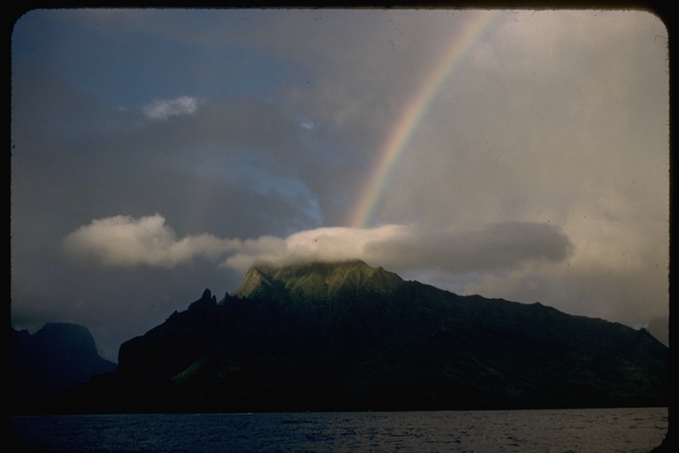 Rainbow on mountain peak Rainbow on mountain peak