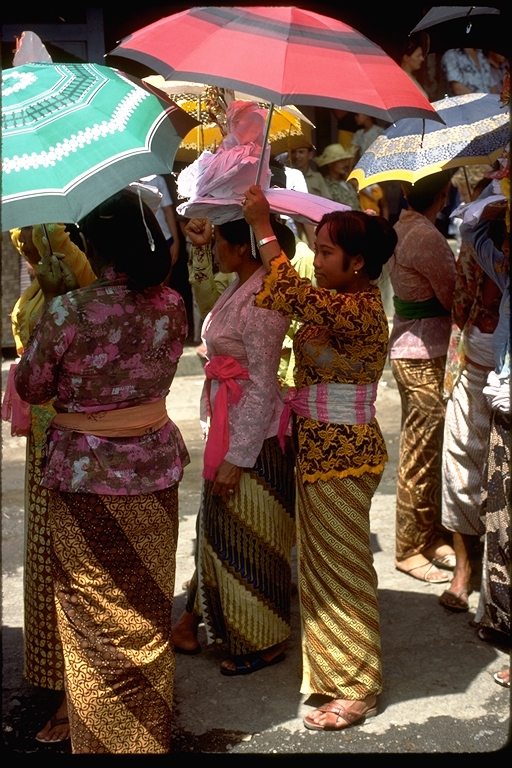 Women at burial and cremation celebration, Bali, Indonesia Women at burial and cremation celebration, Bali, Indonesia